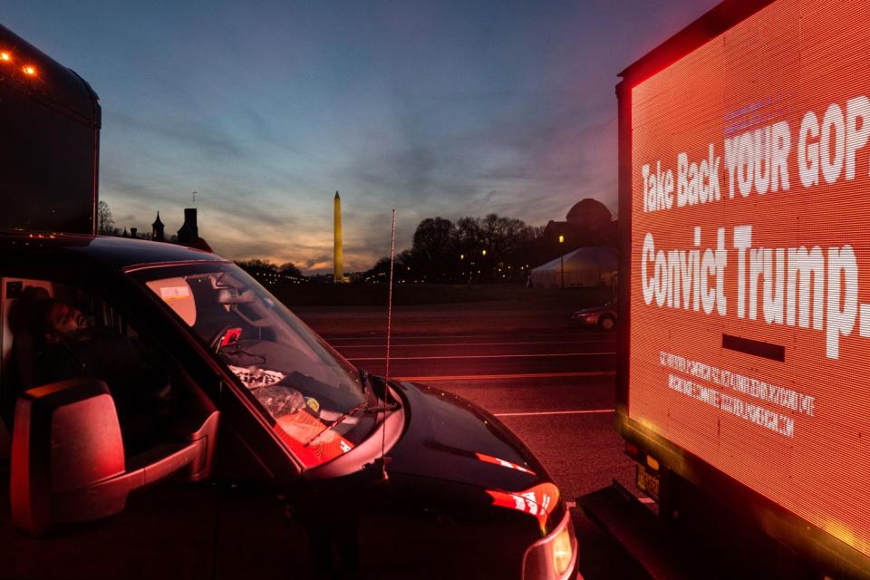 A truck displays anti-Trump messages.