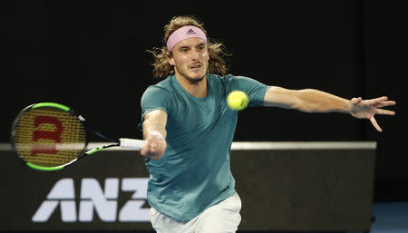 Tennis - Australian Open - Fourth Round - Melbourne Park, Melbourne, Australia, January 20, 2019. Greece’s Stefanos Tsitsipas in action during the match against Switzerland’s Roger Federer. REUTERS/Adnan Abidi