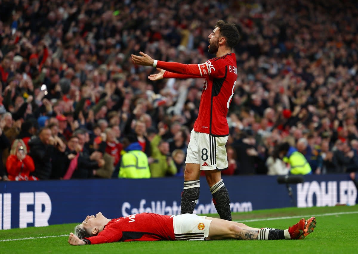 Bruno Fernandes and Alejandro Garnacho celebrate United’s late win (Reuters)