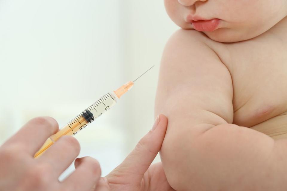 Baby Getting Vaccine In Arm