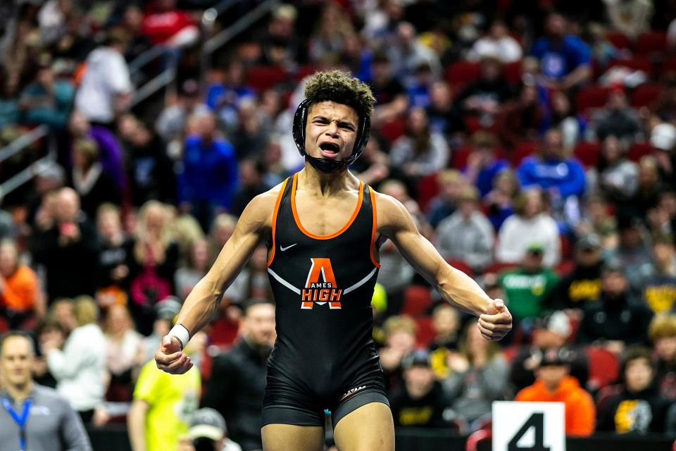 Ames' Jabari Hinson reacts after his match at 126 pounds during the Class 3A high school boys state wrestling tournament semifinals, Friday, Feb. 17, 2023, at Wells Fargo Arena in Des Moines, Iowa.