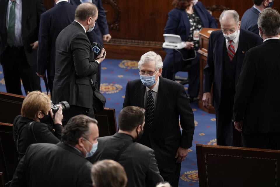 FILE - Senate Majority Leader Mitch McConnell of Ky., departs as a joint session of the House and Senate convenes to count the Electoral College votes cast in November's election, at the Capitol in Washington, Wednesday, Jan. 6, 2021. (AP Photo/J. Scott Applewhite, File)