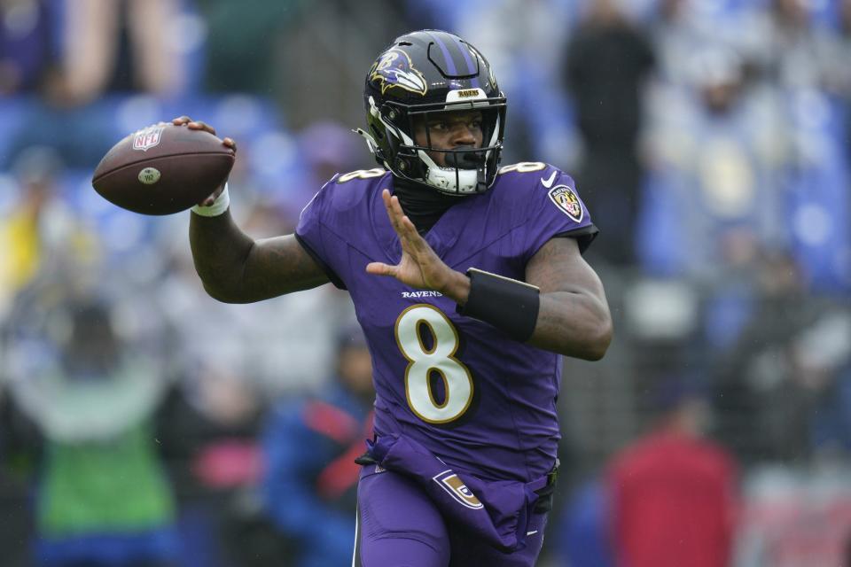 Dec 10, 2023; Baltimore, Maryland, USA; Baltimore Ravens quarterback Lamar Jackson (8) passes during the first quarter against the Los Angeles Rams at M&T Bank Stadium. Mandatory Credit: Jessica Rapfogel-USA TODAY Sports