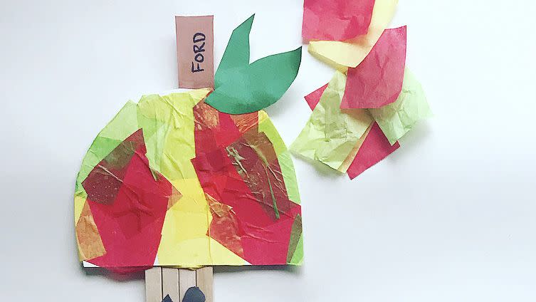 back to school activities an apple made from layered tissue paper and craft sticks