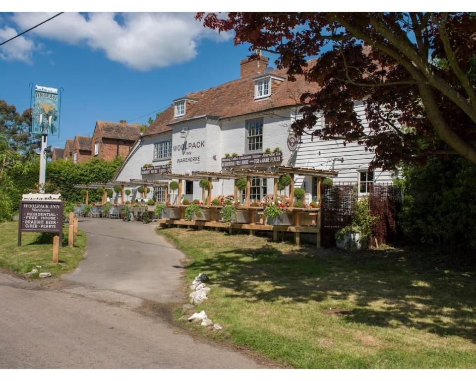 <p>This 16th century pub is a dreamy bolthole perfect for escaping urban life.</p><p>In the morning, the breakfasts consist of local hen's eggs, Kent sourdough and yoghurt from the nearby East Kent Downs, while slap-up seafood dinners won't disappoint come dinner time.</p><p>The beautiful beach of Camber Sands is just a short drive away, so you can enjoy a powdery stroll before snuggling up with a G&T fireside at the inn.</p><p>Decor is quirky shabby chic: think dairy urns for bedside table and old rowing oars as wall art, while some rooms boast roll-top baths. The ideal cosy-up cocoon for couples.</p><p><a class="link " href="https://www.redescapes.com/offers/kent-warehorne-woolpack-inn-hotel" rel="nofollow noopener" target="_blank" data-ylk="slk:READ OUR REVIEW AND BOOK;elm:context_link;itc:0;sec:content-canvas">READ OUR REVIEW AND BOOK</a></p><p><a class="link " href="https://www.booking.com/hotel/gb/the-woolpack-inn-ashford.en-gb.html?aid=2070929&label=romantic-hotels-kent" rel="nofollow noopener" target="_blank" data-ylk="slk:BOOK NOW;elm:context_link;itc:0;sec:content-canvas">BOOK NOW</a></p>