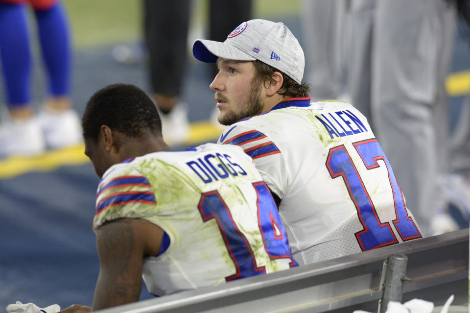 Buffalo Bills quarterback Josh Allen (17) and wide receiver Stefon Diggs (14) sit on the bench in the second half of an NFL football game against the Tennessee Titans Tuesday, Oct. 13, 2020, in Nashville, Tenn. The Titans won 42-16. (AP Photo/Mark Zaleski)