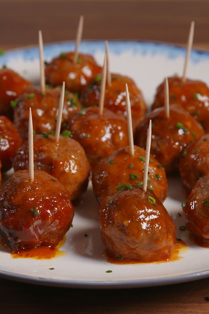 <p>Don't let their size fool you, these slow-cooker mini meatballs are packed with flavor.</p><p>Get the recipe from <a href="https://www.delish.com/cooking/recipe-ideas/recipes/a50599/slow-cooker-party-meatballs-recipe/" rel="nofollow noopener" target="_blank" data-ylk="slk:Delish;elm:context_link;itc:0;sec:content-canvas" class="link ">Delish</a>.</p>