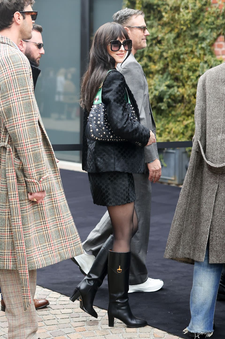 milan, italy february 24 dakota johnson is seen arriving at the gucci fashion show during the milan fashion week womenswear fallwinter 20232024 on february 24, 2023 in milan, italy photo by jacopo raulegetty images