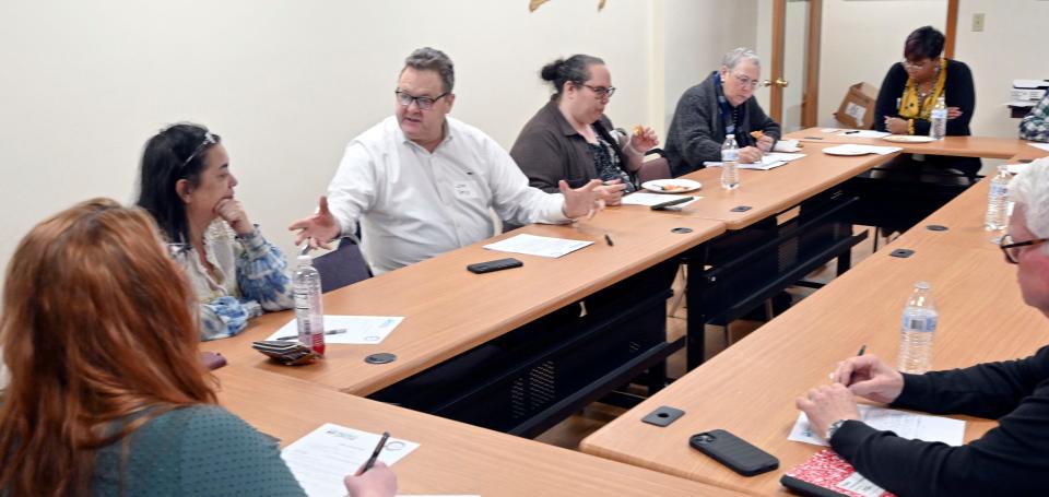 Dennis Select Board Vice Chair John Terrio talks about housing during a Housing Assistance Corporation and Leadership Cape Cod class held Thursday in Hyannis. About a dozen people attended to learn how to deliver successful public comment in support of housing.