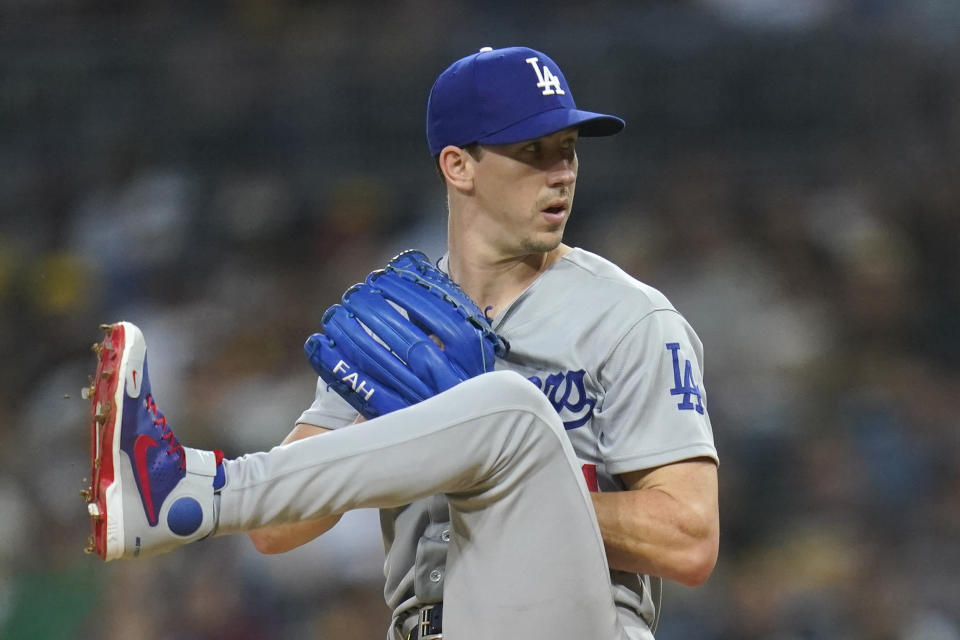 Los Angeles Dodgers starting pitcher Walker Buehler winds up during the first inning of the team's baseball game against the San Diego Padres on Wednesday, Aug. 25, 2021, in San Diego. (AP Photo/Gregory Bull)