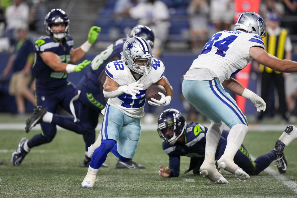Dallas Cowboys running back Deuce Vaughn runs for a touchdown against the Seattle Seahawks during the second half of a preseason NFL football game Saturday, Aug. 19, 2023, in Seattle. (AP Photo/Stephen Brashear)