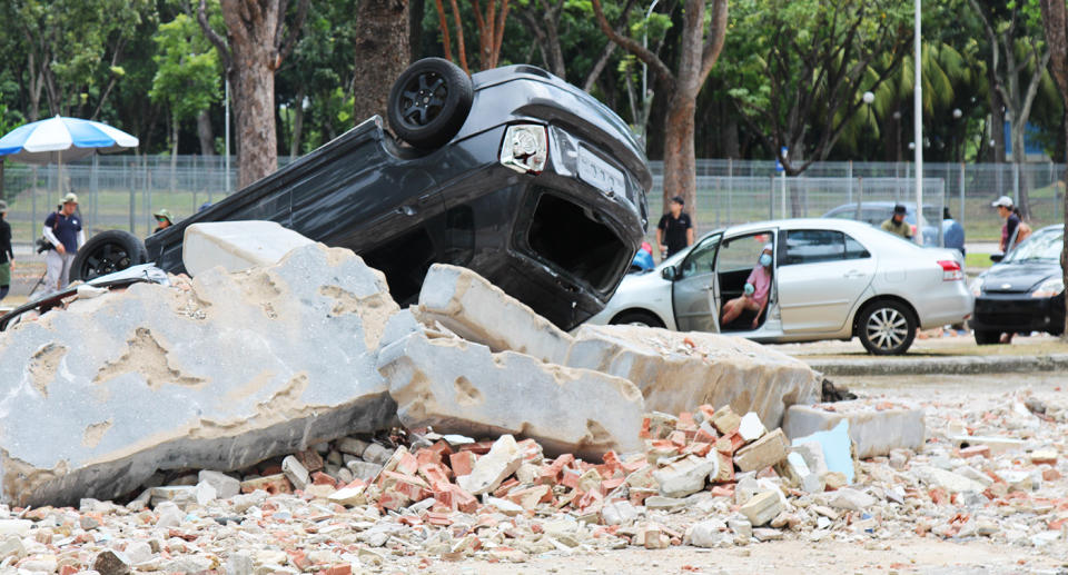 Many used cars and debris could be seen at the filming site. (Photo: Gabriel Choo / Yahoo Lifestyle Singapore)
