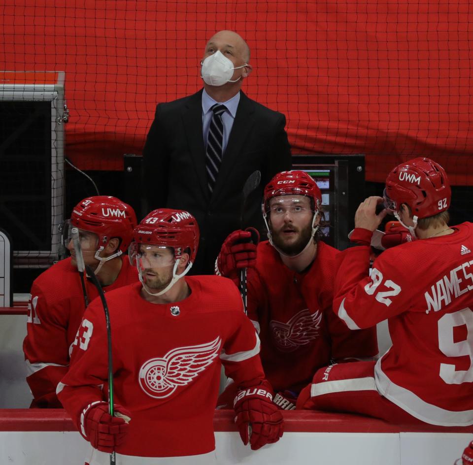 Red Wings coach Jeff Blashill looks at the scoreboard in the second period on Thursday, April 15, 2021, at Little Caesars Arena.