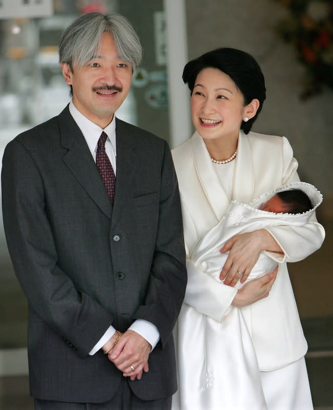 FILE PHOTO: Japan's Princess Kiko and husband Prince Akishino smile as they leave Tokyo hospital with newborn son Prince Hisahito in Tokyo