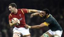 Rugby Union Britain - Wales v South Africa - Principality Stadium, Cardiff, Wales - 26/11/16 Wales' George North is tackled by South Africa's Uzair Cassiem Reuters / Rebecca Naden Livepic