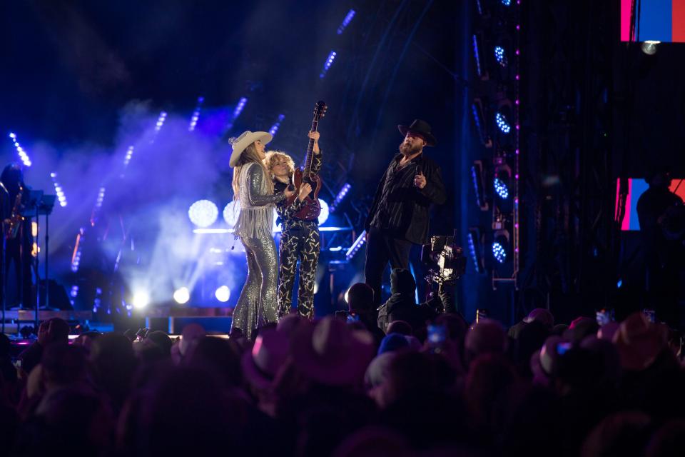 Lainey Wilson, Grace Bower, and Jackson Dean perform during Nashville’s Big Bash, New Years Eve celebration at Bicentennial Capitol Mall State Park in Nashville , Tenn., Sunday, Dec. 31, 2023.