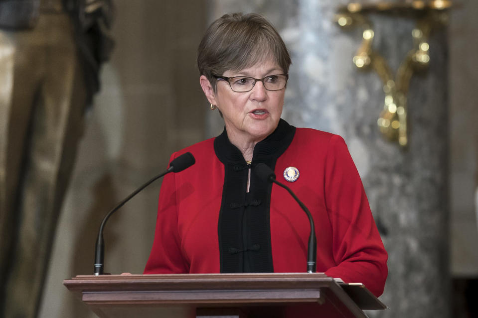 FILE - Kansas Gov. Laura Kelly speaks at the dedication and unveiling ceremony of a statue in honor of Amelia Earhart in Statuary Hall, at the Capitol in Washington, July 27, 2022. Kelly wasted little time after a decisive victory in Kansas for abortion rights before sending out a national fundraising email warning that access to the procedure would be “on the chopping block” if her party did not win in the November elections. (AP Photo/J. Scott Applewhite, File)