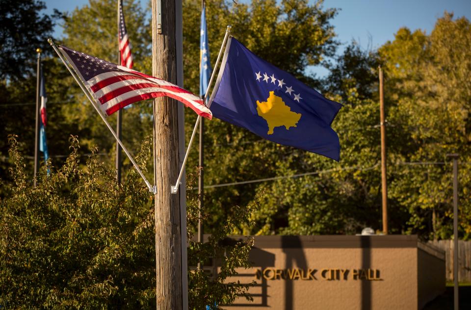 The flag of the Republic of Kosovo flies in front of  Norwalk City Hall Wednesday, Oct. 18, 2018. Norwalk became the sister city for Vustrri, Kosovo, in 2018.