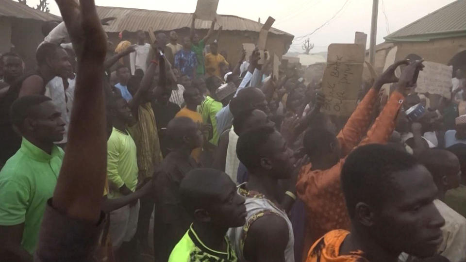 A screengrab taken from video shows families of abducted pupils gathering during the visit of Kaduna state Gov. Uba Sani   on March 7, 2024, after gunmen kidnapped more than 280 pupils from a school in Kuriga, Kaduna, northern Nigeria. / Credit: AFPTV/AFP via Getty Images