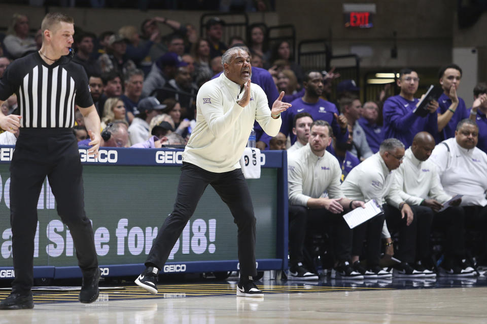 Kansas State coach Jerome Tang reacts during the second half of an NCAA college basketball game against West Virginia, Saturday, March 4, 2023, in Morgantown, W.Va. (AP Photo/Kathleen Batten)