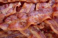 <p>When stored in the freezer, delicious bacon can be preserved for a month. And although bacon is a tried-and-true breakfast favorite, did you know you’ve likely been <a href="https://www.thedailymeal.com/cook/you-ve-been-cooking-bacon-all-wrong?referrer=yahoo&category=beauty_food&include_utm=1&utm_medium=referral&utm_source=yahoo&utm_campaign=feed" rel="nofollow noopener" target="_blank" data-ylk="slk:cooking it wrong this entire time;elm:context_link;itc:0;sec:content-canvas" class="link ">cooking it wrong this entire time</a>? </p>