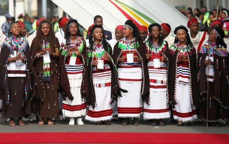 Traditional dancers perform during the welcoming ceremony of Eritrea's President Isaias Afwerki arriving for a three-day visit, at the Bole international airport in Addis Ababa, Ethiopia July 14, 2018. REUTERS/Tiksa Negeri