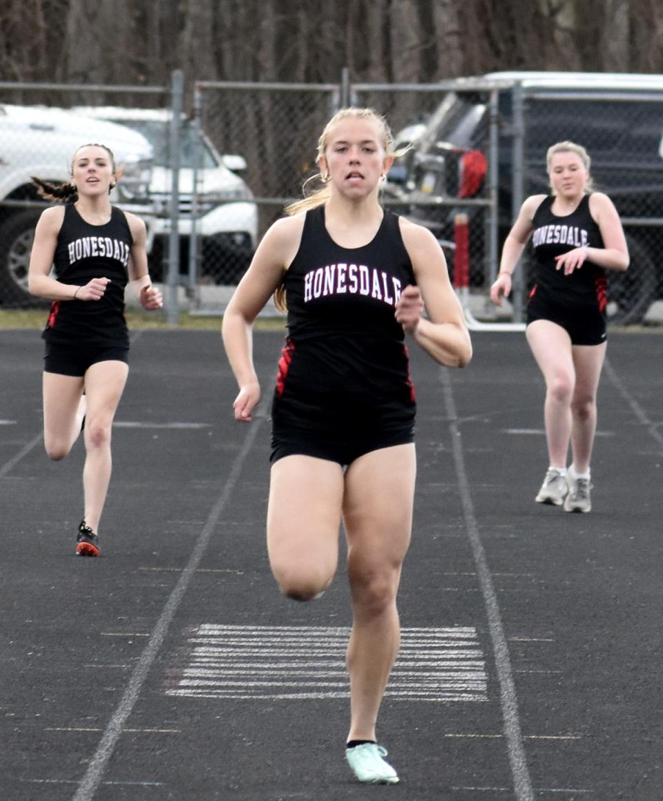 Rachael Collins of Honesdale has her eyes fixed on the finish line during the 200M versus Western Wayne. The senior finished first in a time of 27.7.