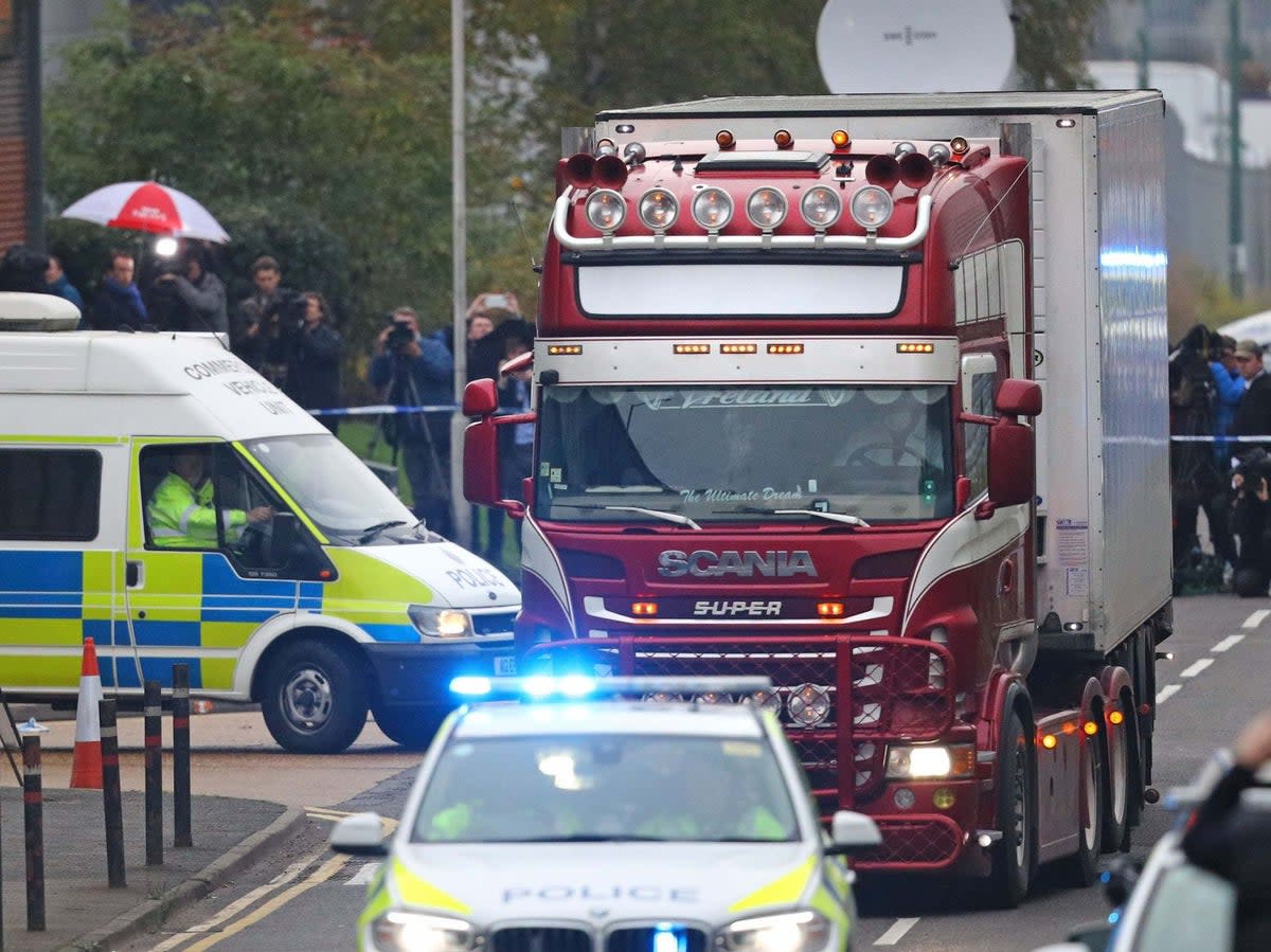 The container lorry where 39 people were found dead inside leaves Waterglade Industrial Park in Grays, Essex (PA)