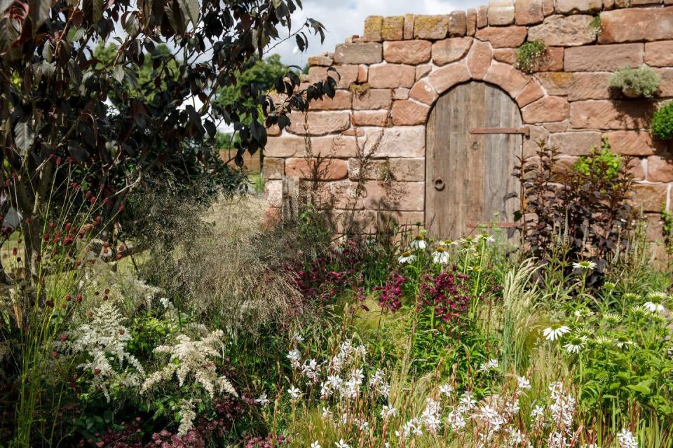 <p><strong>SHOW GARDEN | Awarded: Silver-Gilt</strong></p><p>A disused farm building has left its mark in this garden, leaving behind a stone wall with original features. Aiming to inspire with a sense of romance and beautiful abandonment, a bespoke pergola built from reclaimed oak frames the family seating area, providing character, a sense of age, and shade from the sun.</p>