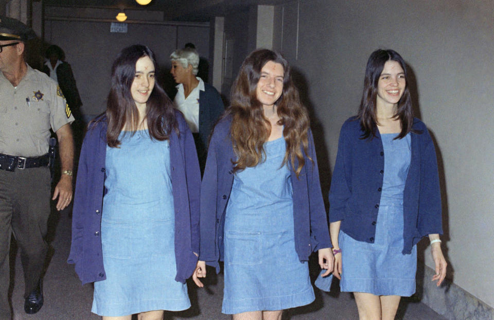 In this Aug. 20, 1970, file photo, Charles Manson followers, from left, Susan Atkins, Patricia Krenwinkel and Leslie Van Houten walk to court to appear for their roles in the 1969 cult killings of seven people in Los Angeles. 