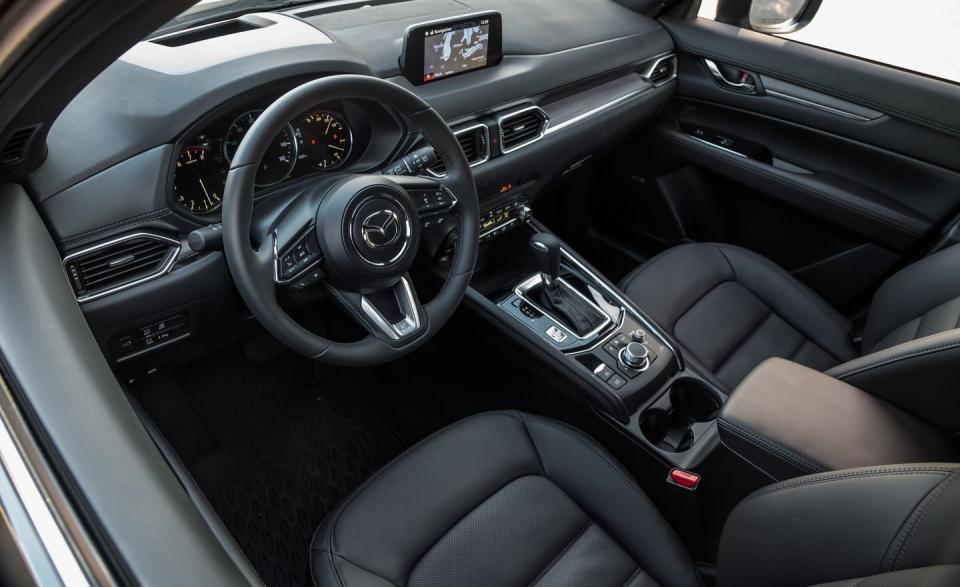 <p>A more powerful turbo engine and a swanky new trim level vault Mazda's charming compact crossover into premium territory.</p>