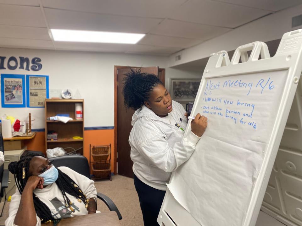 Janyssa Camp was among about a dozen community members who gathered at Creative Visions in Des Moines on Nov. 20, 2021, to discuss how adults can intervene to reduce gun violence among the city's young people. Camp, 30, of Des Moines wrote next steps the group plans on taking.