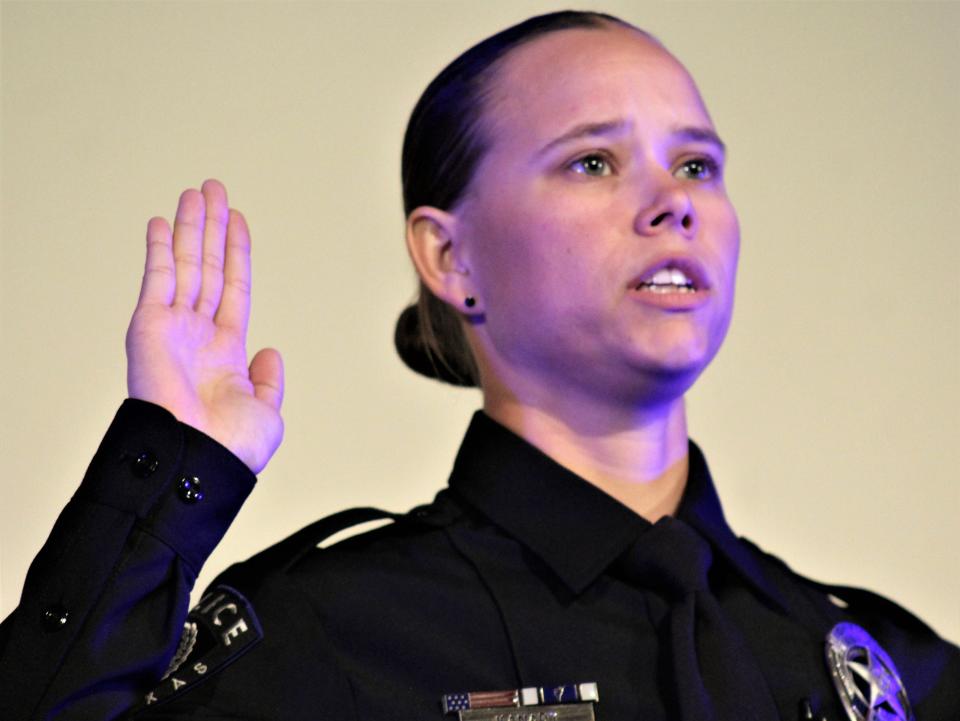 Brooklyn Kanady is sworn in as an Abilene Police Department officer as one of nine members of Class 60.