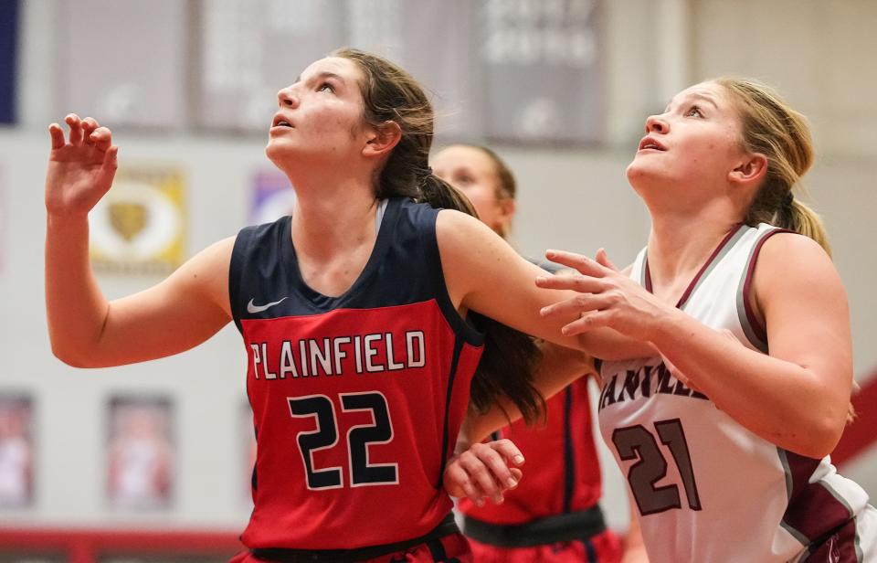 Plainfield Quakers guard Hannah Menser (22) watches the ball against Danville's forward Addison Davis (21) on Saturday, Jan. 6, 2024, during the game at Danville Community High School in Danville.