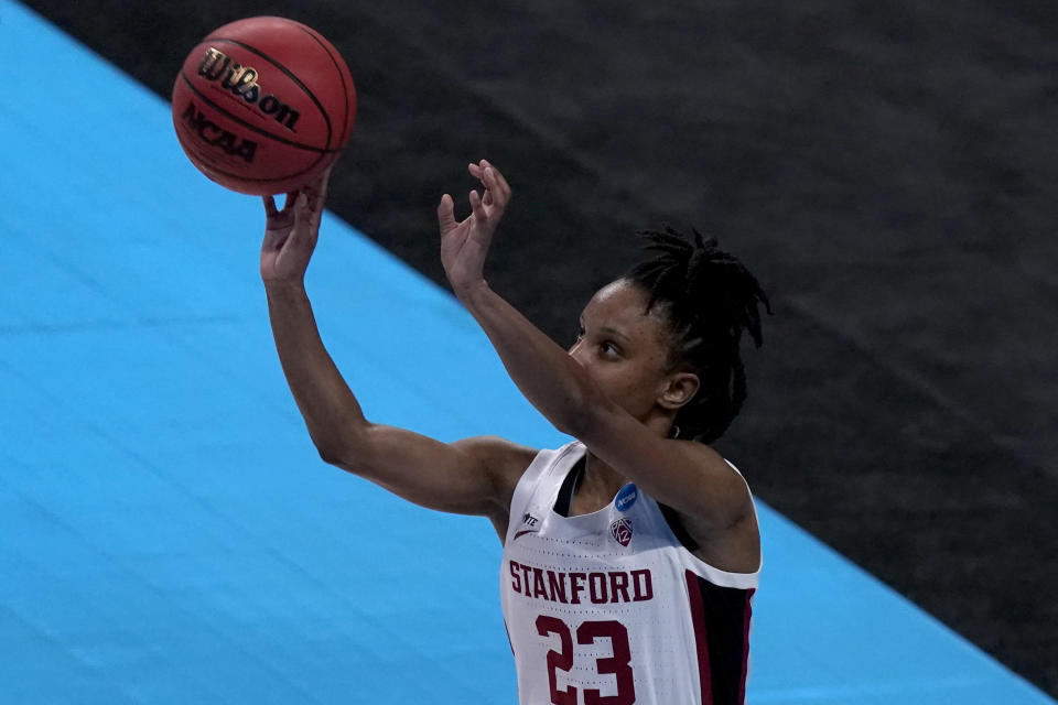 Stanford guard Kiana Williams shoots a three-point shot during the second half of a college basketball game against Utah Valley in the first round of the women's NCAA tournament at the Alamodome in San Antonio, Sunday, March 21, 2021. (AP Photo/Charlie Riedel)