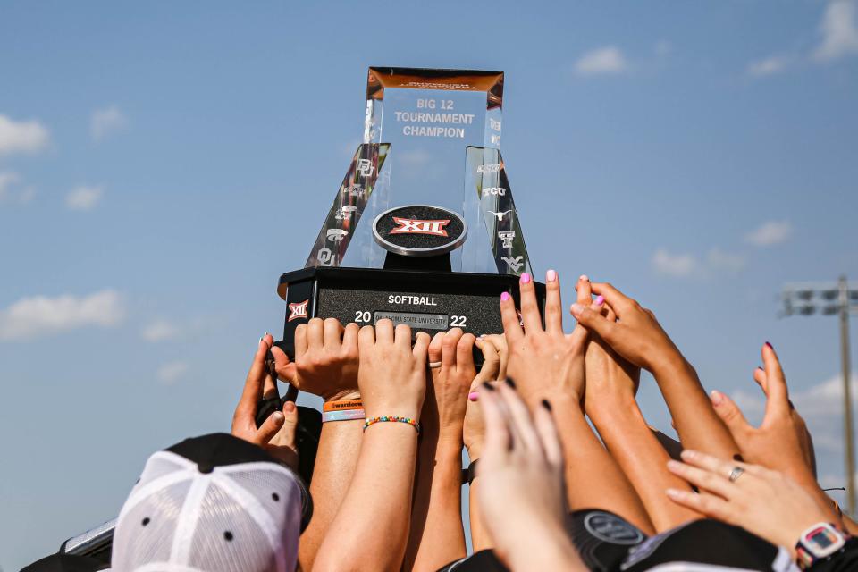 The Oklahoma State Cowgirls celebrate after defeating the Oklahoma Sooners in the Big 12 Softball Championship at USA Softball Hall of Fame Complex in Oklahoma City on Saturday, May 14, 2022.