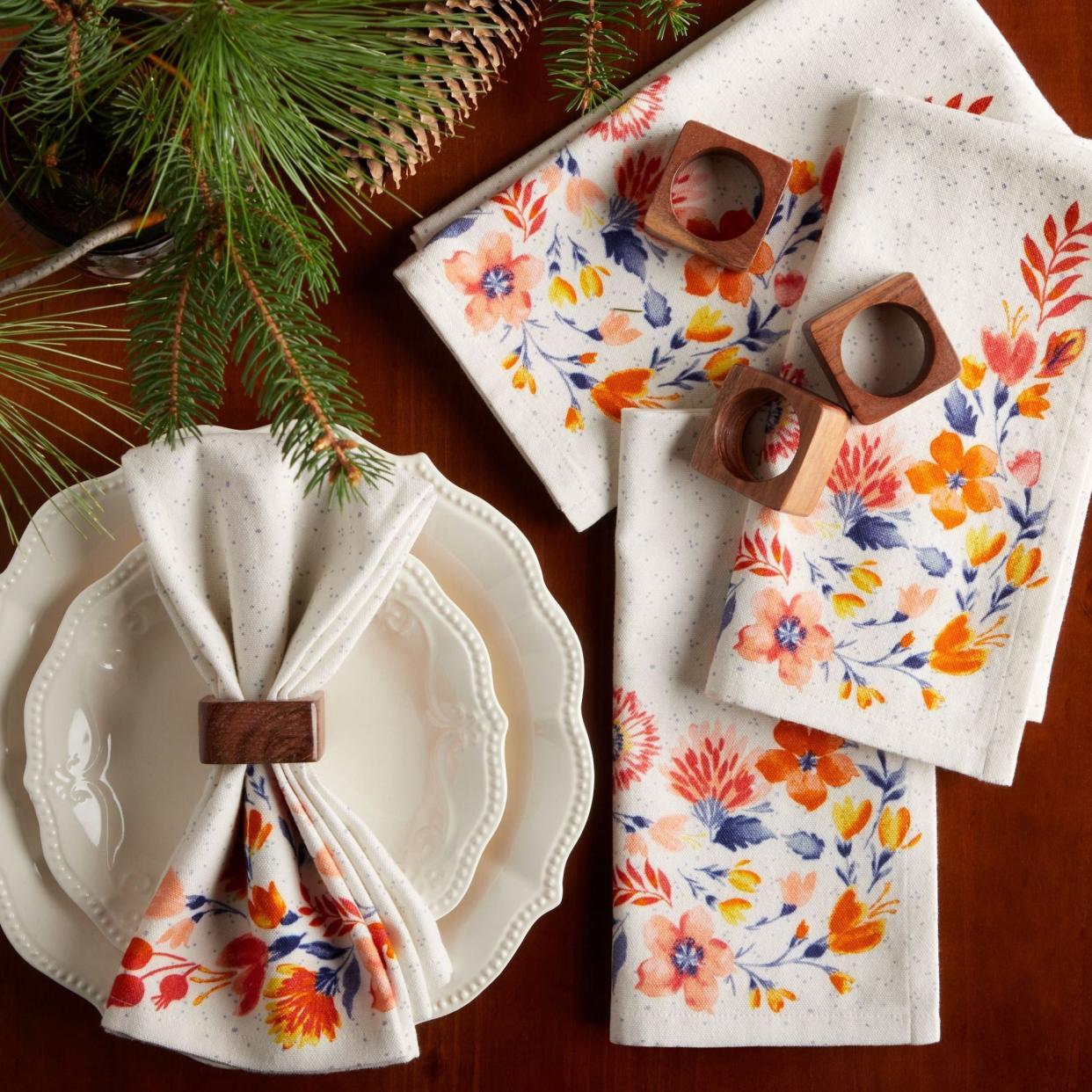 <p><a href="https://go.redirectingat.com?id=74968X1596630&url=https%3A%2F%2Fwww.walmart.com%2Fip%2FThe-Pioneer-Woman-Fluttering-Fancies-Napkins-And-Napkin-Rings-Set-Multicolor-8-Piece%2F1112761938&sref=https%3A%2F%2F" rel="nofollow noopener" target="_blank" data-ylk="slk:Shop Now;elm:context_link;itc:0;sec:content-canvas" class="link rapid-noclick-resp">Shop Now</a></p><p>The Pioneer Woman Fluttering Fancies Napkins And Napkin Rings Set</p><p>walmart.com</p><p>$18.88</p>