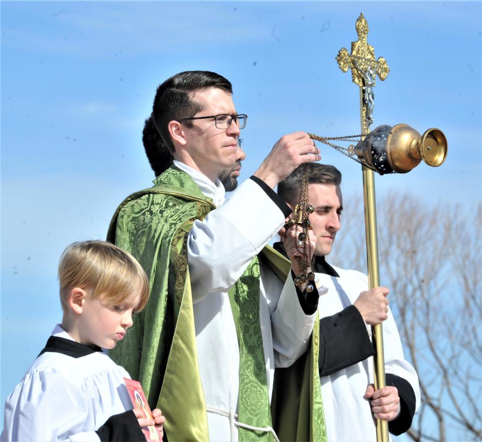 Father Peter Kavanaugh blesses Lake Wichita during the Saint Benedict Orthodox Church blessing ceremony at Lake Wichita.