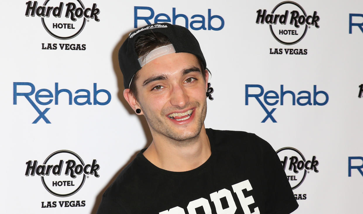LAS VEGAS, NV - APRIL 27:  Singer Tom Parker of The Wanted arrives at the Hard Rock Hotel & Casino during the resort's Rehab pool party on April 27, 2014 in Las Vegas, Nevada.  (Photo by Gabe Ginsberg/FilmMagic)