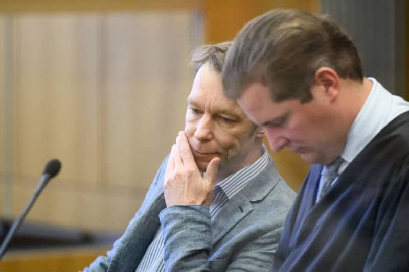 The defendant Christian B. (L) sits next to his lawyer Friedrich Fuelscher in the courtroom at Braunschweig Regional Court. Christian B. is accused of three cases of aggravated rape and two cases of sexual abuse of children in Portugal. Julian Stratenschulte/dpa Pool/dpa