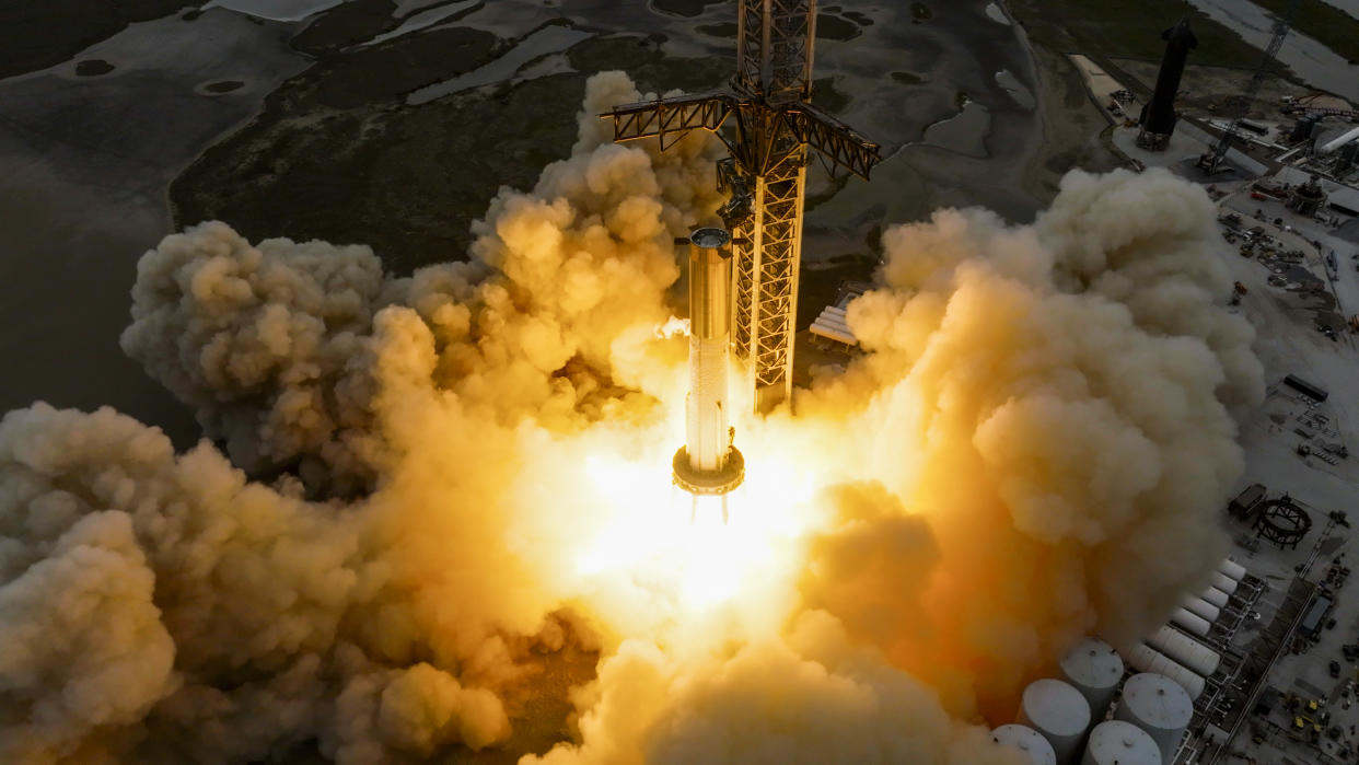  SpaceX's Booster 7 Starship first-stage prototype ignites 31 of its 33 Raptor engines during a static fire test on Feb. 9, 2023. 