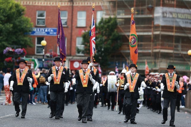 Members of the Orange Order take part in a Twelfth of July parade in Belfast