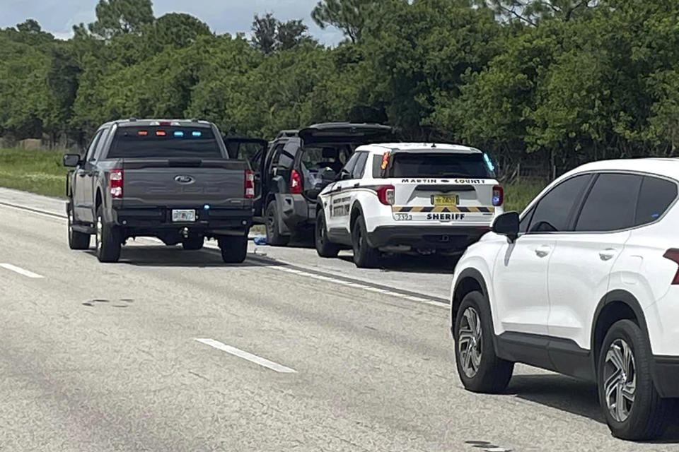 This photo from the Martin County Sheriff's Office shows sheriff's vehicles surrounding an SUV on northbound I-95 in Martin County on Sunday, Sept. 15, 2024. (Martin County Sheriff's Office via AP)