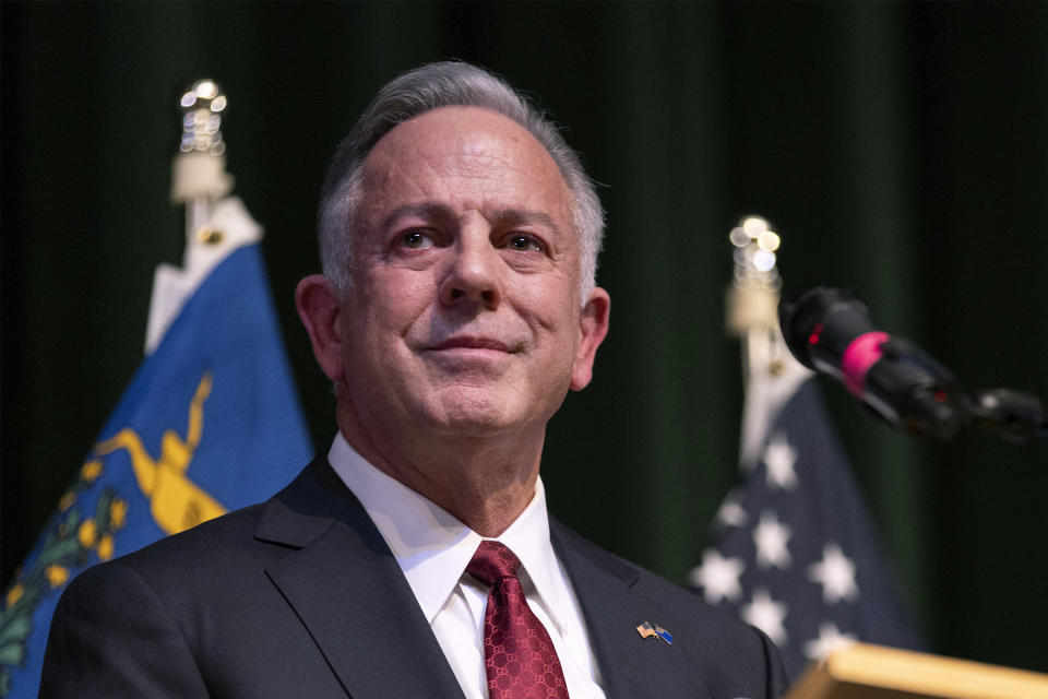 FILE - Clark County Sheriff and Nevada Gov.-elect Joe Lombardo gives a victory speech during a news conference Monday, Nov. 14, 2022, in Las Vegas. Nevada's new Republican Gov. Joe Lombardo signed executive orders Thursday, Jan. 12, 2023 indefinitely freezing implementation of new state regulations or occupational licensing requirements, with some exceptions in areas such as public health and safety. (AP Photo/Ellen Schmidt, File)