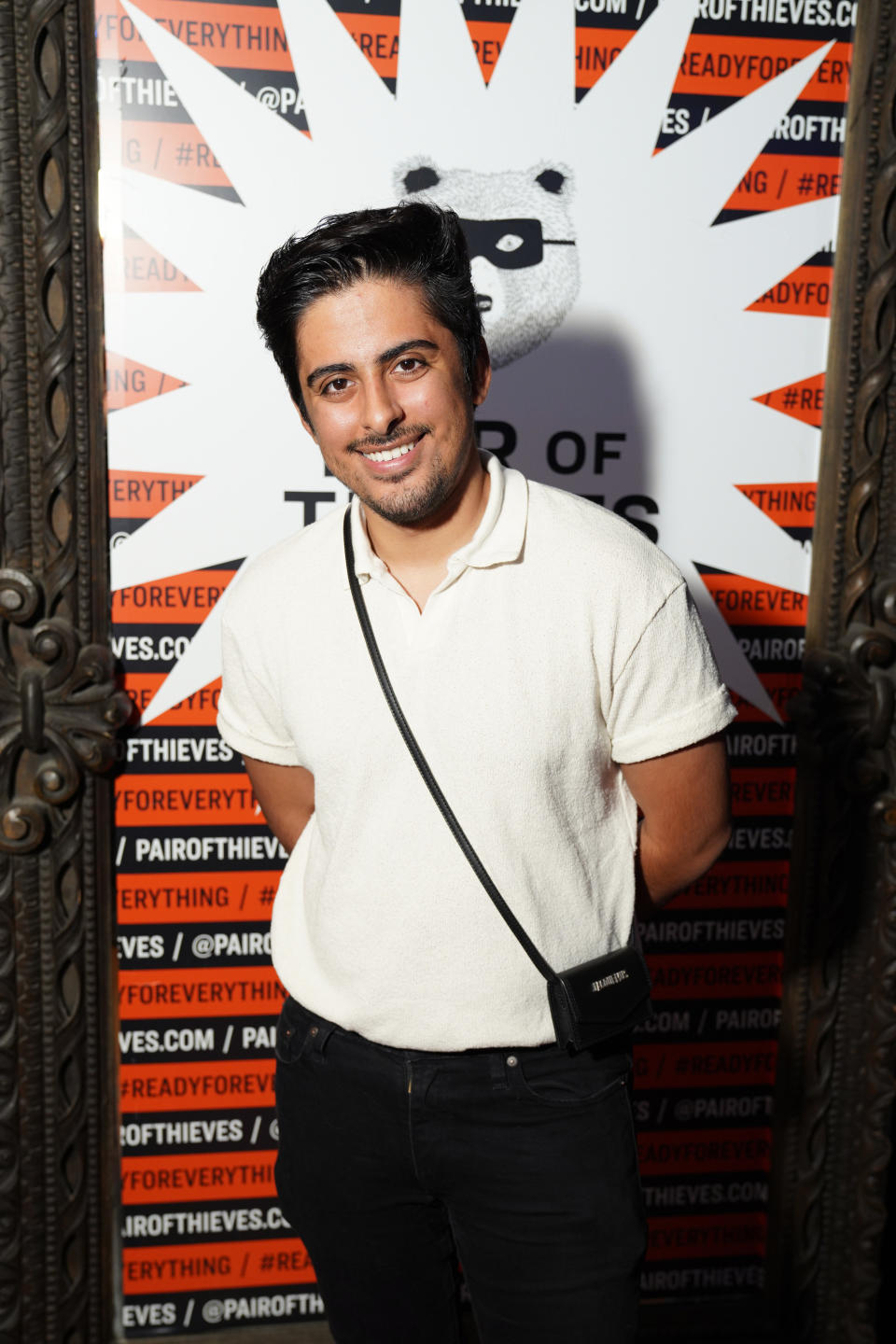 cloeup of Karan smiling at an event