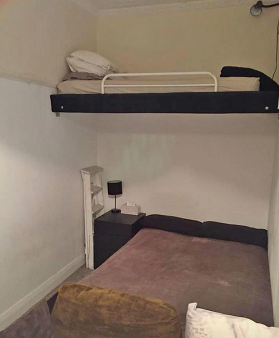 Pictured is an elevated bed which seems barely big enough for an adult above the room's main bed in the Bondi apartment. 