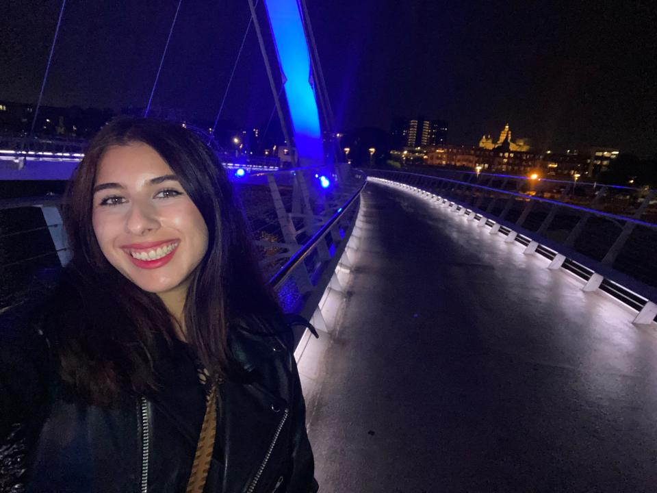 Des Moines Register reporter Paris Barraza captures a selfie at the Iowa Women of Achievement Bridge in Des Moines on Sept. 10, 2023.