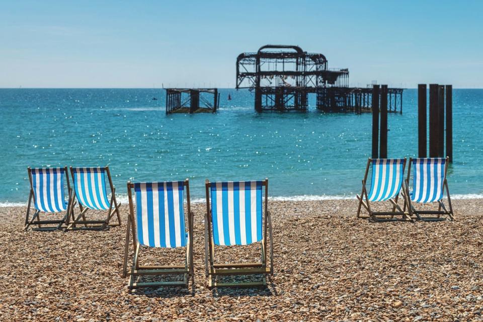 Pebbles, deckchairs and the Palace Pier bless Brighton Beach (Getty Images/iStockphoto)