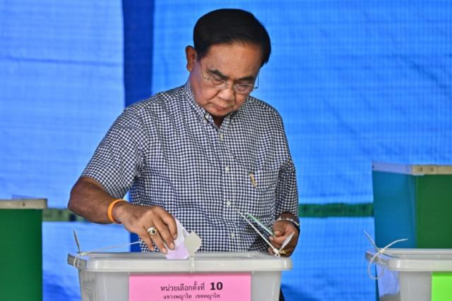 Thai Prime Minister and United Thai Nation Party's candidate Prayut Chan-O-Cha casts his ballot at a polling station during Thailand's general election in Bangkok