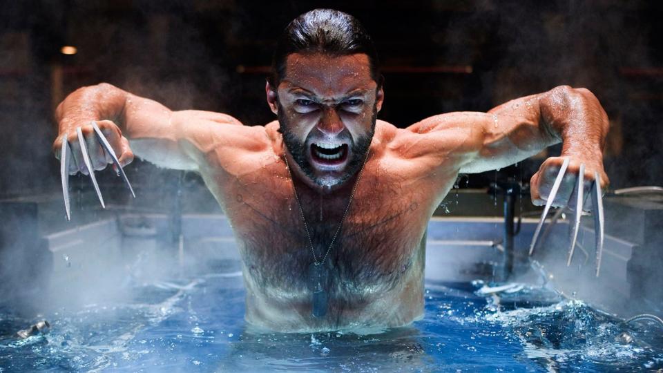 Hugh Jackman's Wolverine emerging from a tank in X-Men Origins: Wolverine